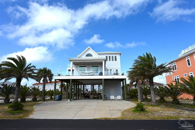 raised beach house with a carport