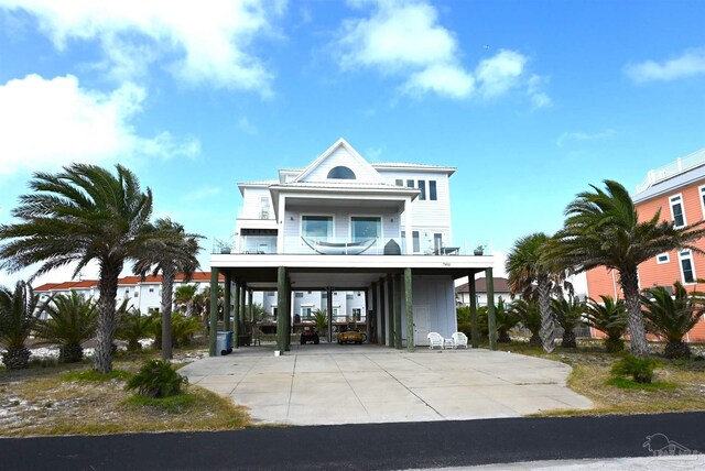 coastal inspired home with a carport