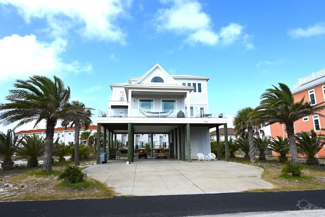 beach home featuring a carport