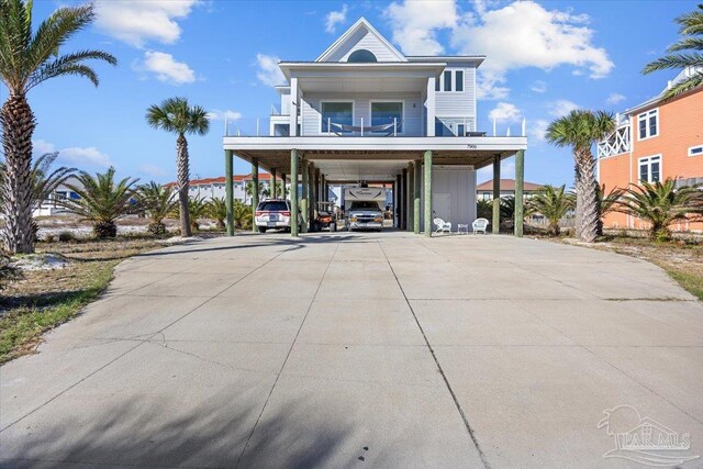 view of front of property with a carport