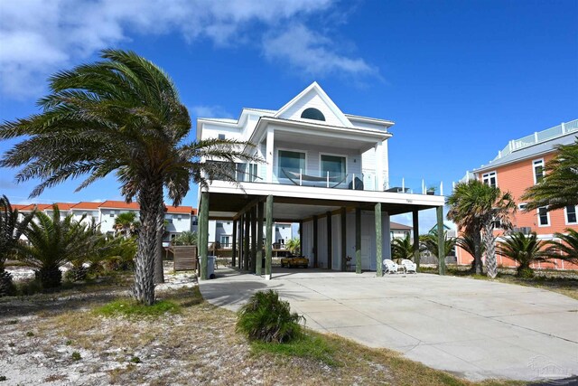 coastal home featuring a carport