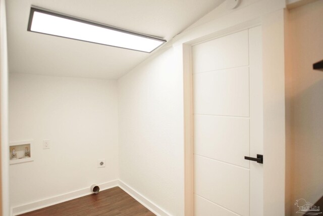 laundry area featuring hookup for a washing machine, dark hardwood / wood-style floors, and hookup for an electric dryer