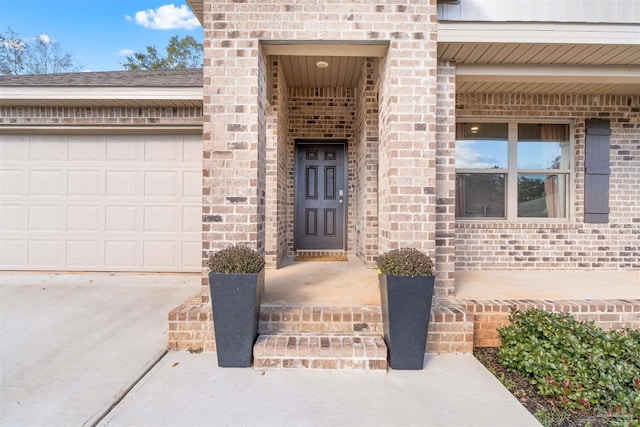 property entrance with a garage