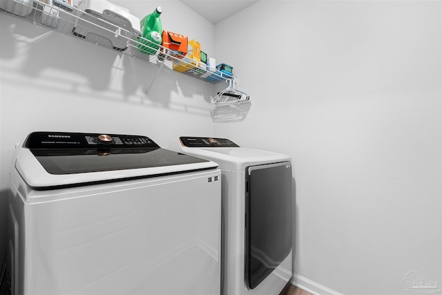 washroom featuring separate washer and dryer