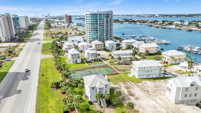 birds eye view of property with a water view