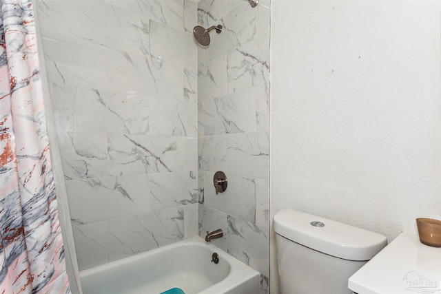 full bathroom featuring vanity, shower / bath combo, and toilet