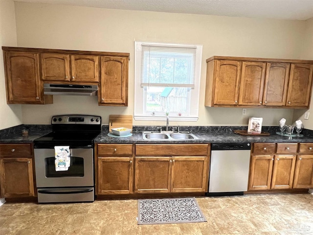 kitchen with appliances with stainless steel finishes and sink