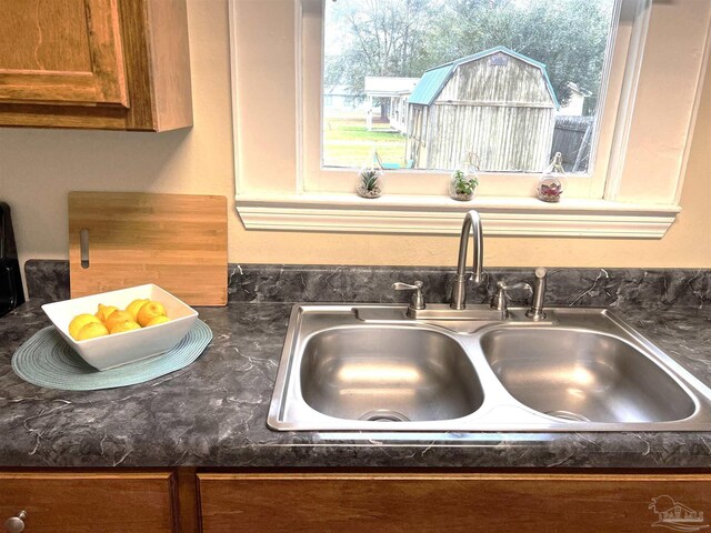 details with sink and dark stone counters