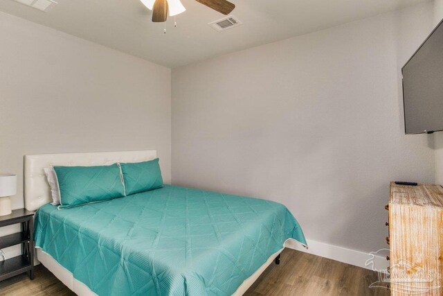 206 N G St, Pensacola, FL 32502 - bedroom with wood finished floors, baseboards, and ceiling fan