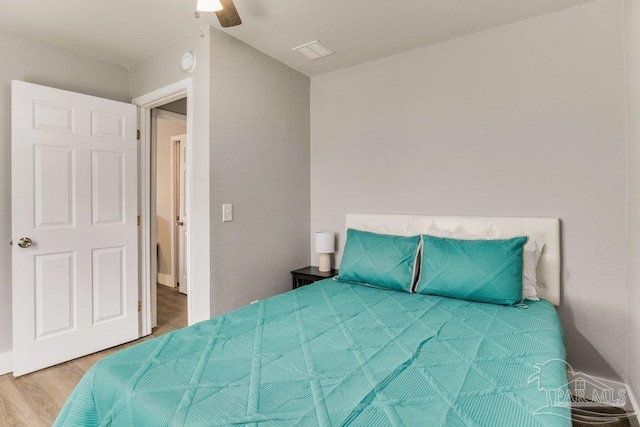 206 N G St, Pensacola, FL 32502 - bedroom featuring wood finished floors and a ceiling fan