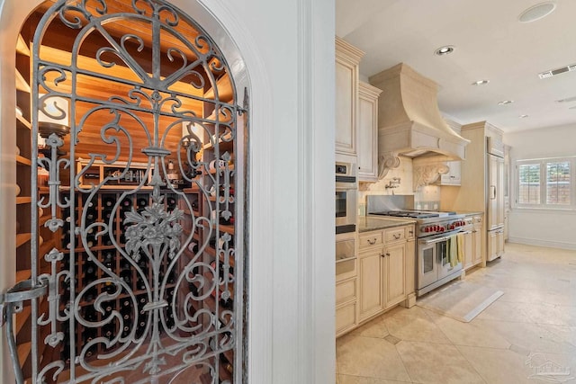 wine room with recessed lighting, visible vents, and light tile patterned flooring