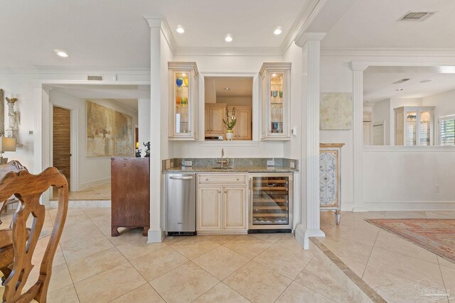 tiled dining area with crown molding and a notable chandelier