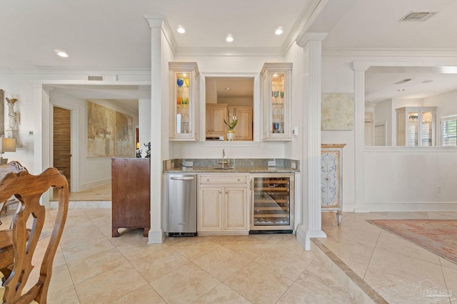 bar featuring crown molding, recessed lighting, ornate columns, beverage cooler, and baseboards