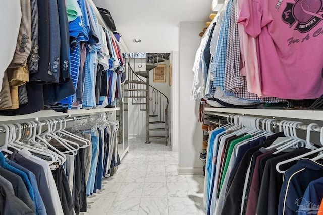 spacious closet featuring light tile patterned floors