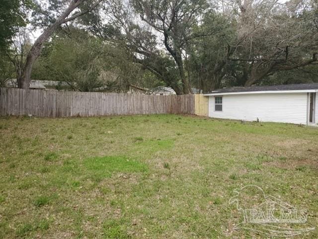 view of yard with fence