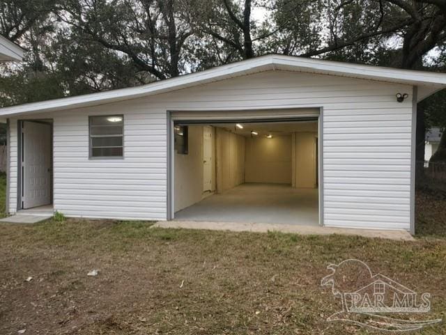 detached garage with driveway