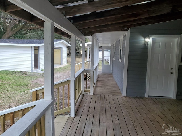 deck with an outdoor structure