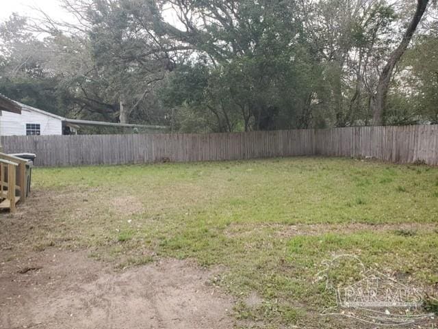 view of yard featuring a fenced backyard