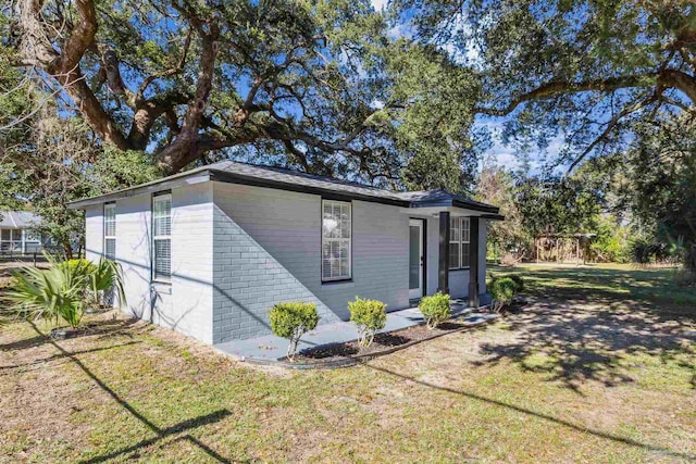 exterior space with a front yard