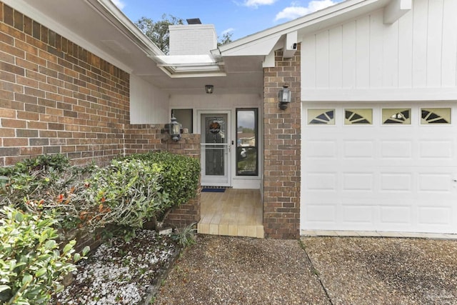 entrance to property featuring a garage