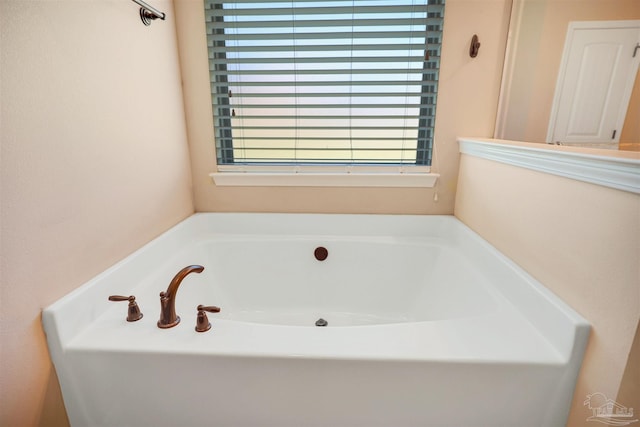 bathroom featuring a tub