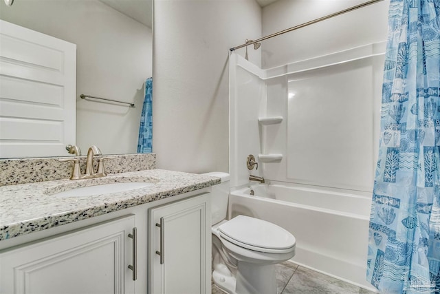 full bathroom with vanity, tile patterned floors, toilet, and shower / bath combo with shower curtain