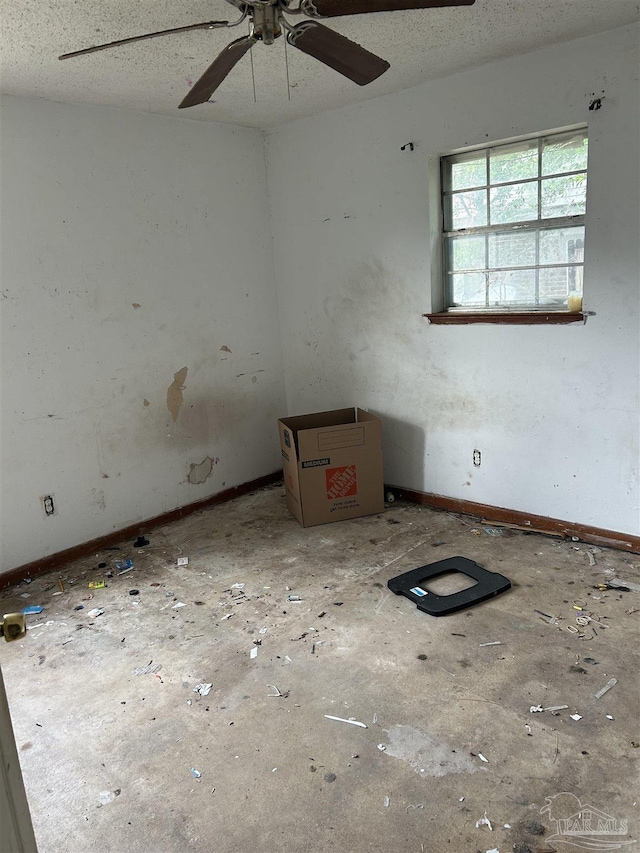 spare room featuring a textured ceiling