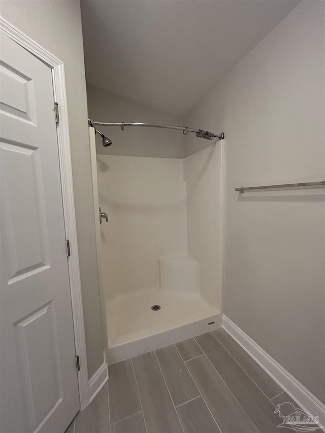 4817 Makenna Cir, Pace, FL 32571 - bathroom featuring walk in shower and baseboards