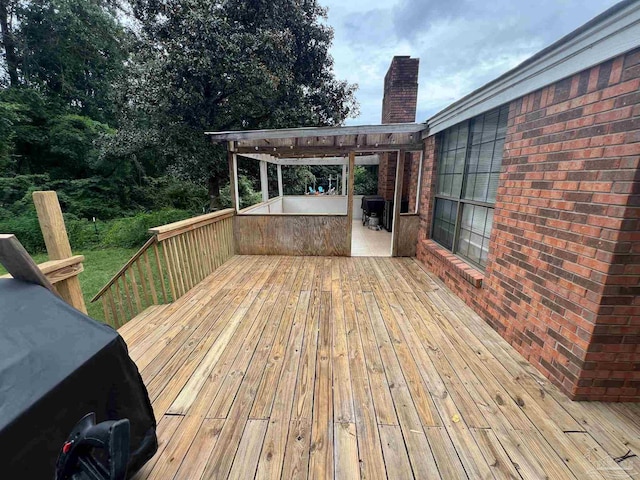 wooden terrace featuring a pergola