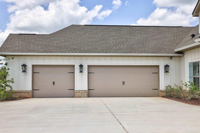 garage featuring driveway