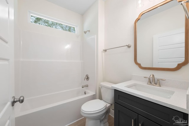 full bathroom featuring shower / washtub combination, vanity, and toilet