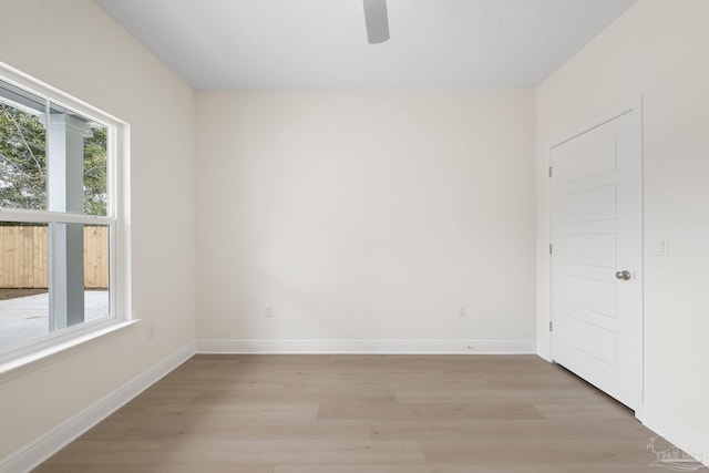 spare room with light hardwood / wood-style floors