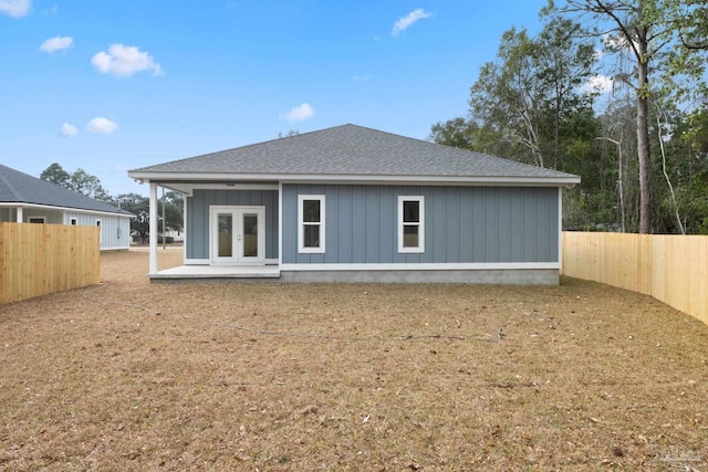 back of house featuring french doors