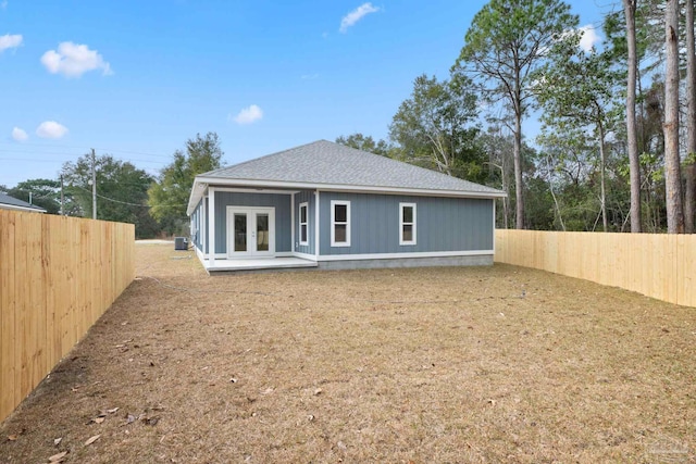 back of property featuring french doors