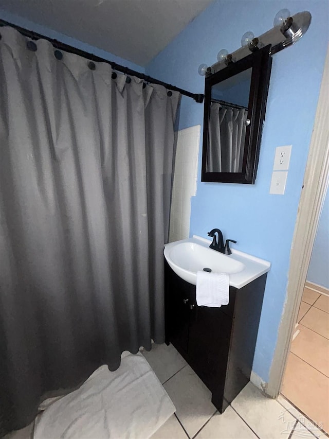 bathroom with vanity and tile patterned floors