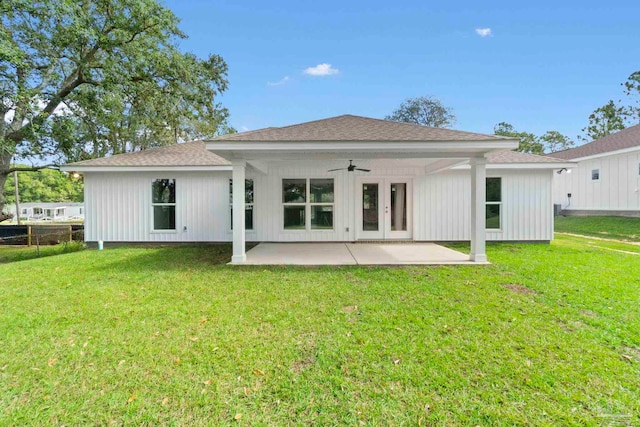 3721 Martin St, Pace, FL 32571 - back of property with a ceiling fan, a patio, a yard, and roof with shingles