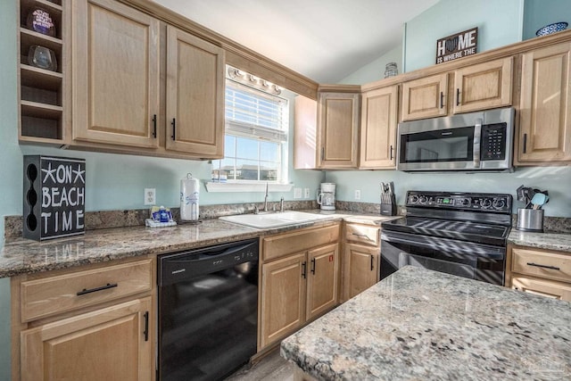 kitchen with lofted ceiling, light brown cabinets, a sink, and black appliances