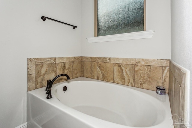 full bath featuring a bath