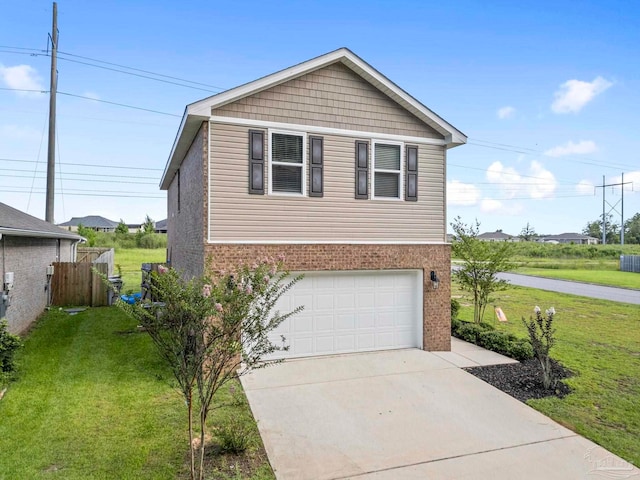 view of front facade with a garage and a front yard