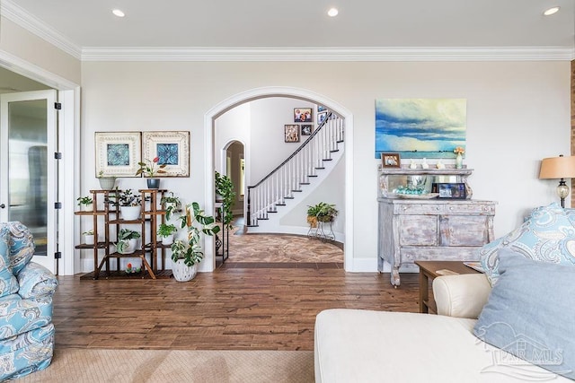 2 Bayou Blvd, Pensacola, FL 32503 - living area featuring arched walkways, stairs, wood finished floors, ornamental molding, and recessed lighting