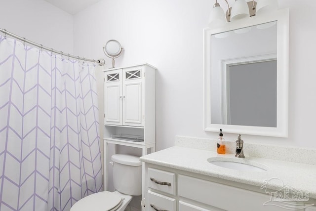 2 Bayou Blvd, Pensacola, FL 32503 - bathroom with toilet, curtained shower, and vanity
