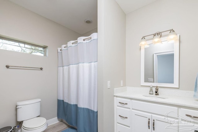 2 Bayou Blvd, Pensacola, FL 32503 - full bathroom with vanity, baseboards, toilet, and curtained shower