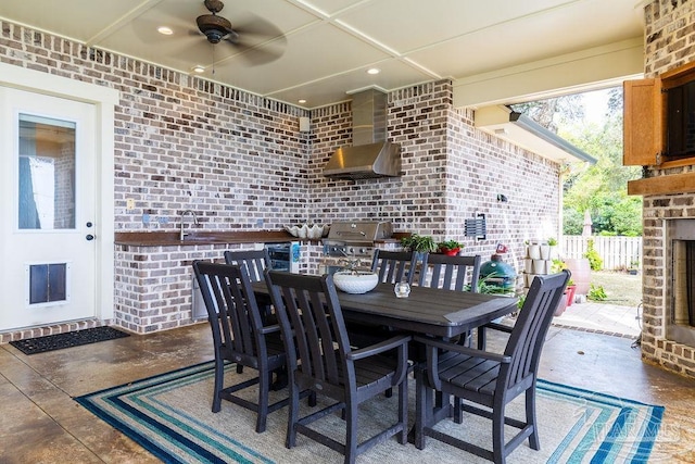 2 Bayou Blvd, Pensacola, FL 32503 - view of patio / terrace with fence, ceiling fan, grilling area, outdoor dining area, and a sink