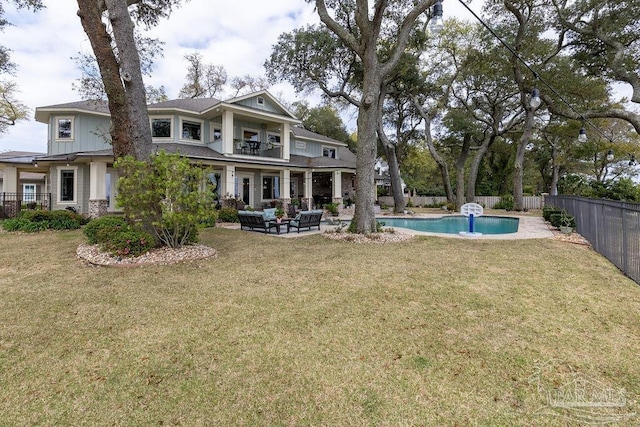 2 Bayou Blvd, Pensacola, FL 32503 - exterior space featuring a fenced backyard, a fenced in pool, a lawn, and a balcony