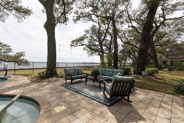 2 Bayou Blvd, Pensacola, FL 32503 - view of patio with an outdoor hangout area, a fenced backyard, and a pool
