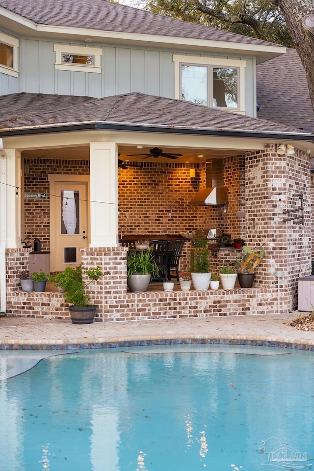 2 Bayou Blvd, Pensacola, FL 32503 - outdoor pool with exterior bar and a ceiling fan