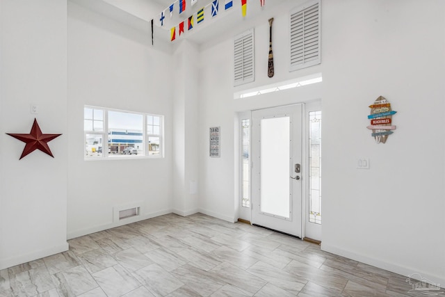 foyer with a high ceiling