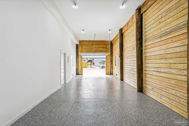 corridor with wood walls