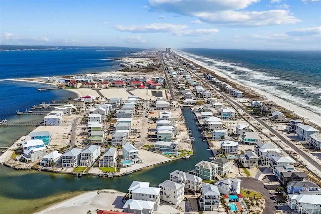 aerial view featuring a water view and a view of the beach