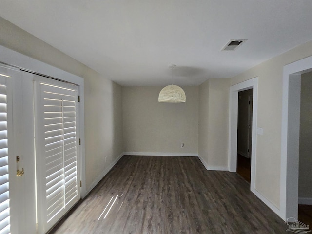 interior space with dark hardwood / wood-style flooring
